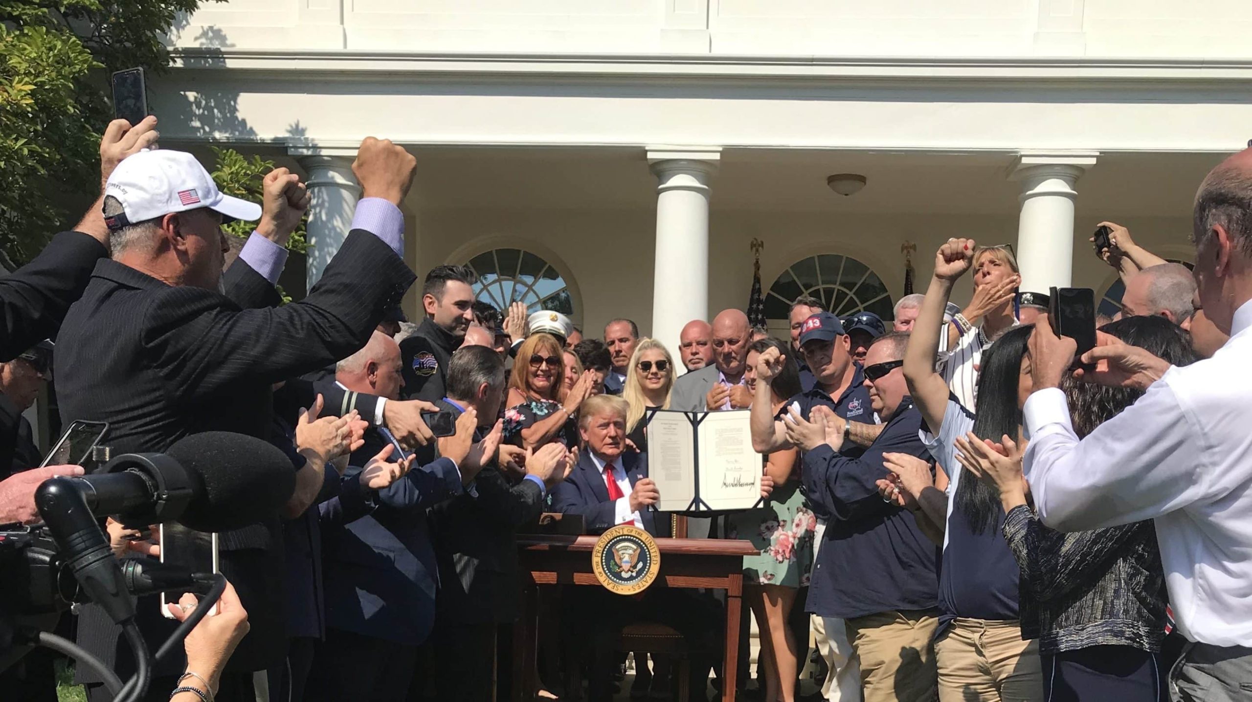NJFOP President joins President Trump in the Rose Garden for 9/11 bill signing